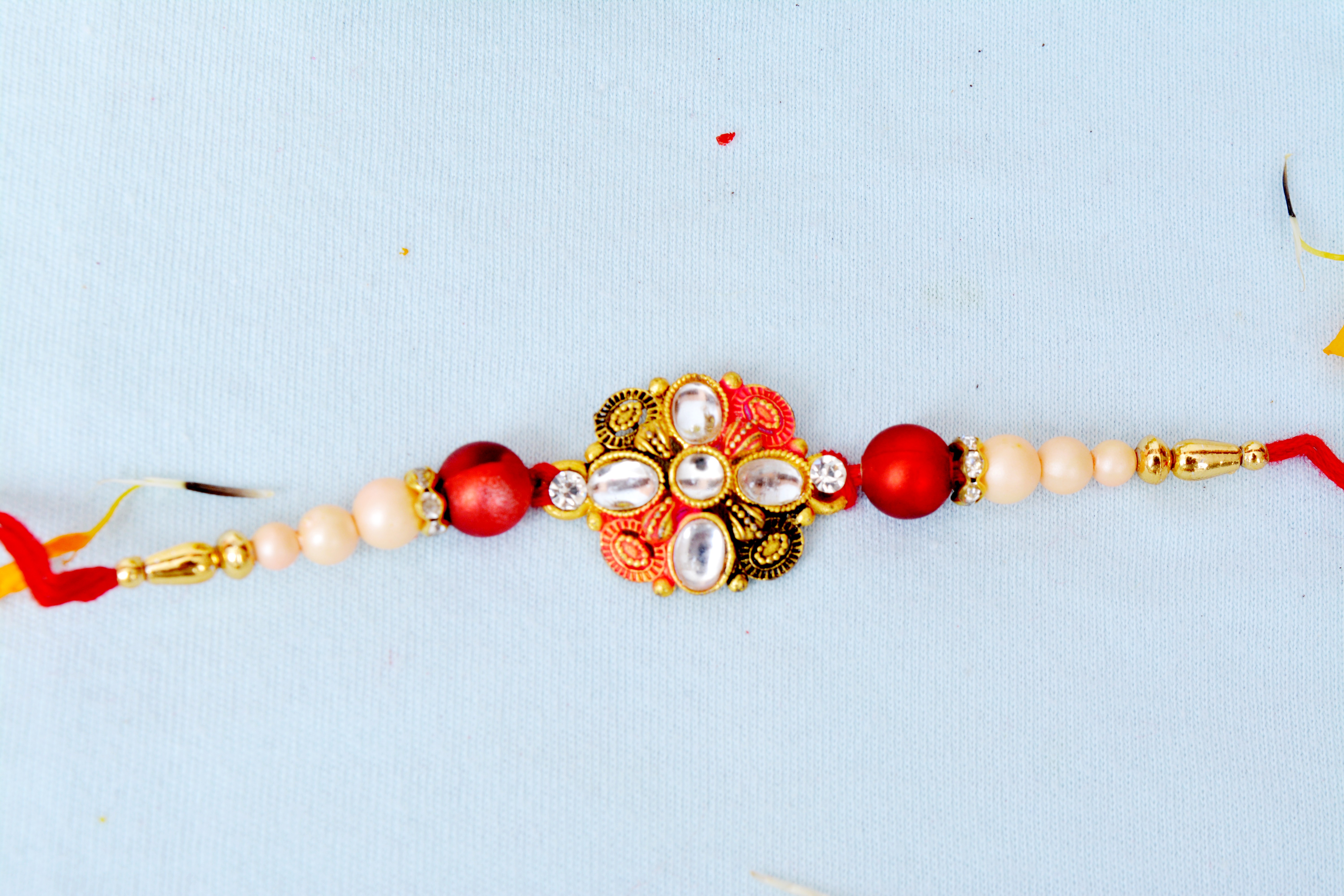 Beads and Stone Flower Rakhi